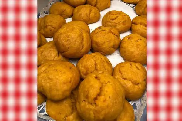 Easy Sweet Potato Biscuits Recipe - Plate of freshly cooked sweet potato biscuits