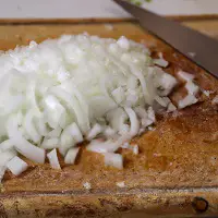 white onions chopped on cutting board